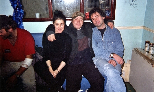 The Equinox wet room Christmas decorations 2003 - My colleague Jackie & me, with Michael and Joe on the far left