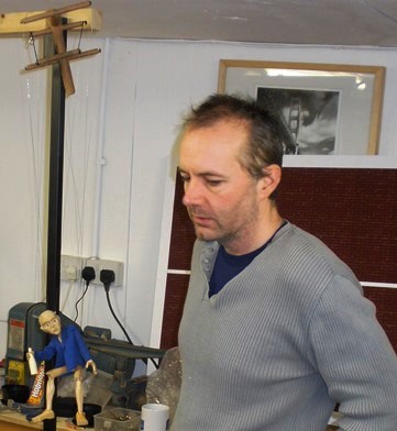 With jacket on and bottle in hand, Paul is ready for action and so is Tony
